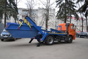 Вывоз строительного мусора бункером-лодочка Воронеж.